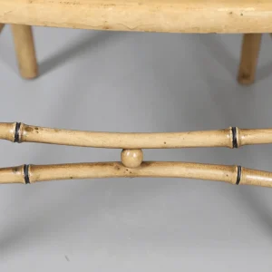 A Pair of Cream Painted Simulated Bamboo Elbow Chairs