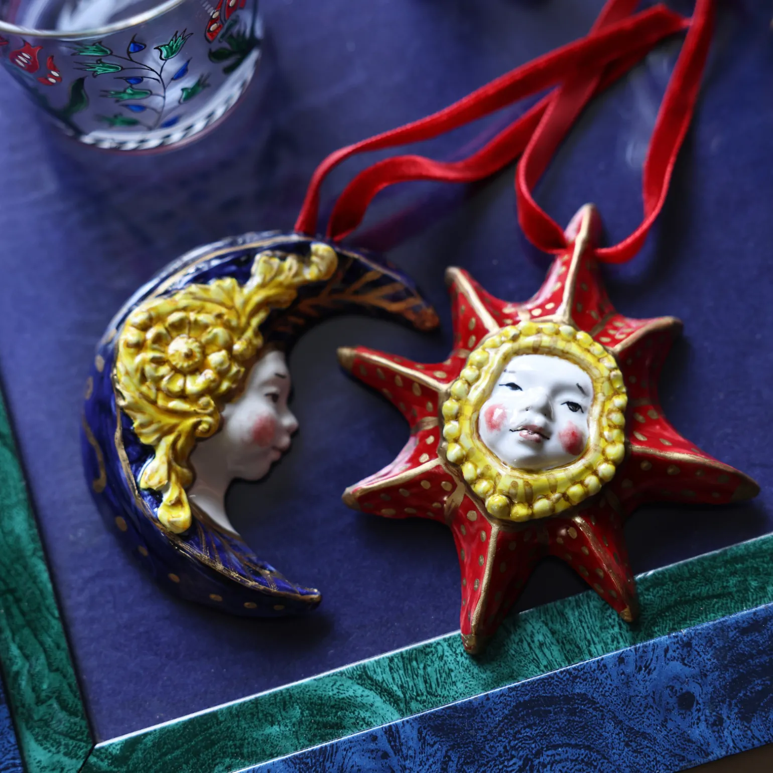 handpainted_ceramic_sun_o_1.webp Hand-Painted Ceramic Sun Ornament